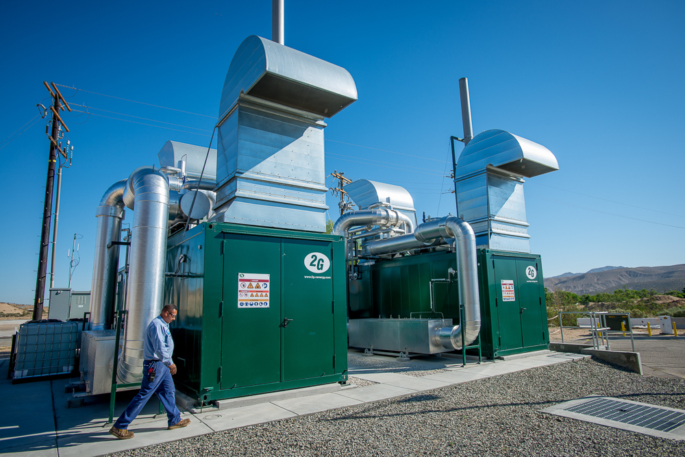 Maintenance mechanic Marcos Avila walks by the 2G generators